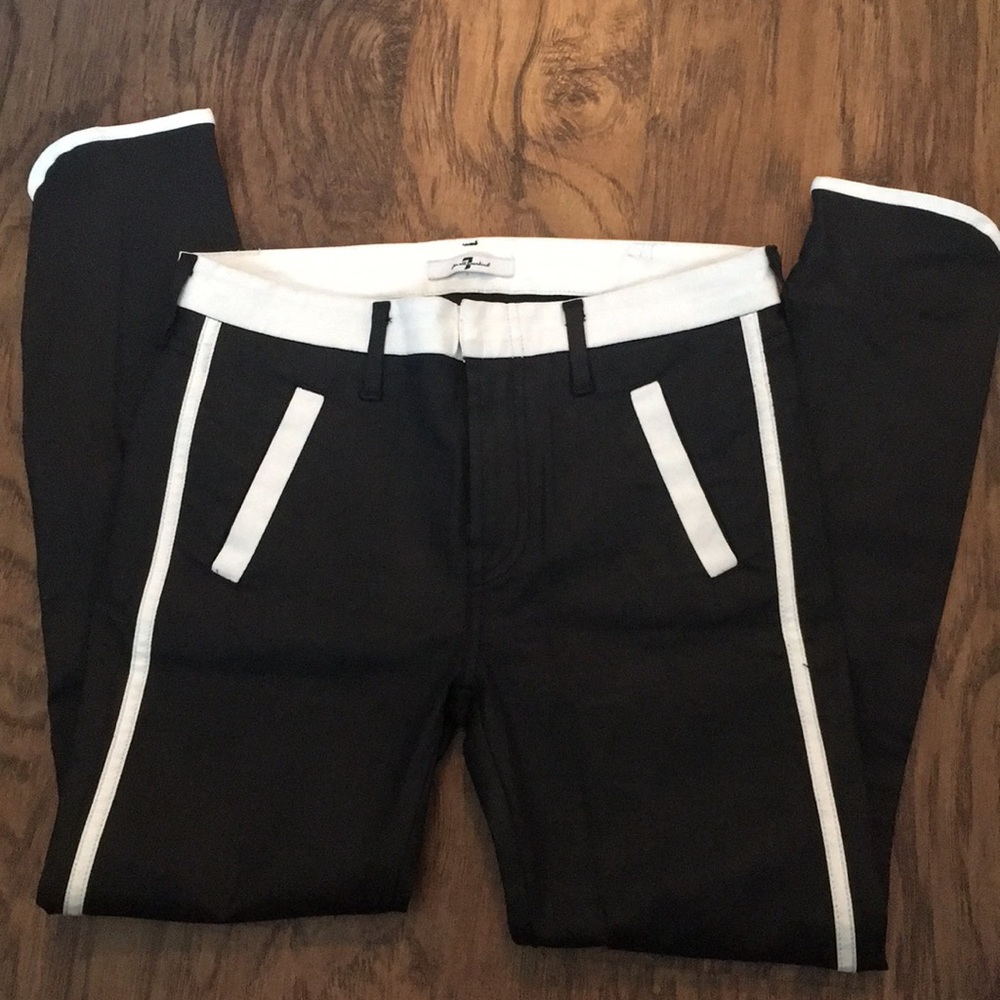 Black Seven skinny jeans with white details.
